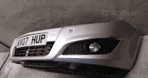 Zderzak przód przedni do opel astra h 3 iii lift fl halogeny Z157 srebrny 4