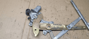 Mechanizm podnośnik szyby lewy tył Daihatsu YRV 262100-1020 85720-97401 2
