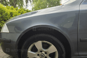 Skoda Octavia II 2 błotnik przód przedni prawy  9901 2