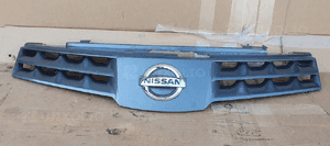 Grill atrapa zderzaka Nissan Note E11 623109U000 623109U100 3