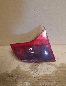 AUDI A4 B7 LAMPA tył lewa w klapę 1