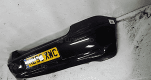 ^ ZDERZAK TYŁ TYLNY DO TOYOTA YARIS I LIFT FL 2O9 CZARNY 3