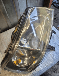 Transporter T5 lampa prawa przednia 7H1941016J 2