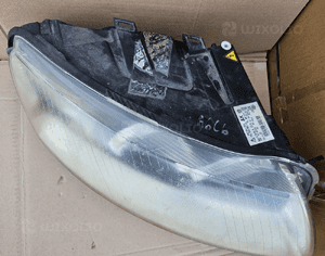 Audi A6 C6 lampa przód przednia Xenon  lewa 8