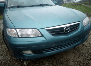 Mazda 626 GF GW 97-02 LIFT    Maska lampa zderzak pas atrapa 18G 22V 2