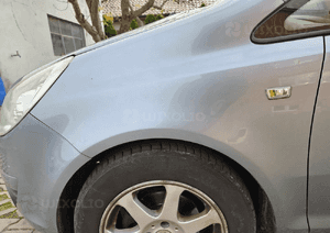 Opel Corsa D Błotnik przód przedni prawy lewy  Z163 1