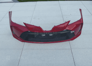 Toyota corolla E21 sedan atrapa zderzaka znaczek oryginał 19