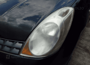 Nissan Note E11 07 lampa przod przednia  lewa 1
