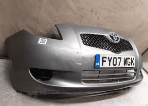Zderzak przód przedni do toyota yaris ii 2 1F8 szary 3