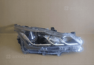 Lampa prawa reflektor toyota corolla E21 sedan 19- 1