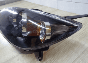 lampa lewa przód TYC Mazda 3 20-a860 3