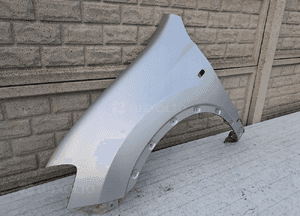 BŁOTNIK PRZEDNI LEWY NISSAN QASHQAI 10-14 LIFT 2