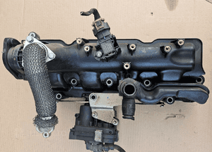 Opel Astra J 4 IV 2.0 CDTI kolektor ssący nastawnik kolektora 55571993 1