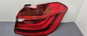 Bmw F45 lampa prawa tylna błotnik 7311030 4