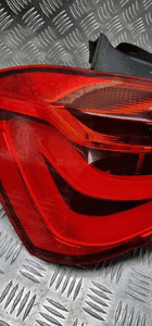Bmw F20 F21 lampa lewa tył tylna w błotnik 7359017 6