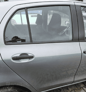 Toyota Yaris II 2 06-11 drzwi tył tylne lewe 1F8 2
