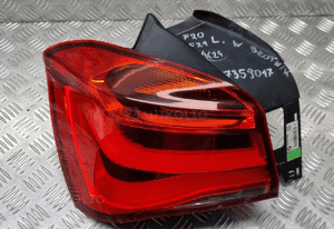 Bmw F20 F21 lampa lewa tył tylna w błotnik 7359017 1
