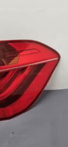 Bmw F45 lampa prawa tylna błotnik 7311030 9
