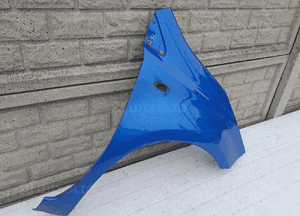 NISSAN NOTE 2006 - 2012 BŁOTNIK PRZEDNI PRAWY 3