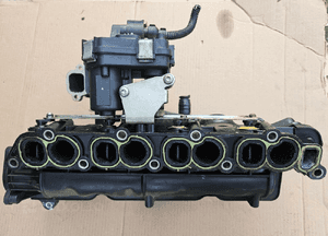 Opel Astra J 4 IV 2.0 CDTI kolektor ssący nastawnik kolektora 55571993 3