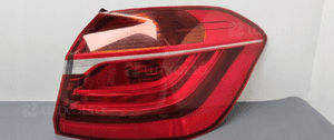 Bmw F45 lampa prawa tylna błotnik 7311030 2
