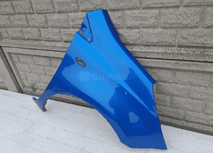 NISSAN NOTE 2006 - 2012 BŁOTNIK PRZEDNI PRAWY 2