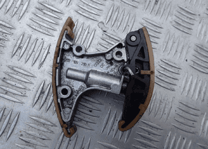 NAPINACZ ŚLIZG ŁAŃCUCHA AUDI VW 3.0 057109218K 1