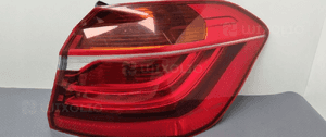 Bmw F45 lampa prawa tylna błotnik 7311030 1